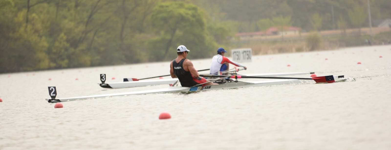 Daniel Marquardt racing the single scull for Samoa on a flatwater course